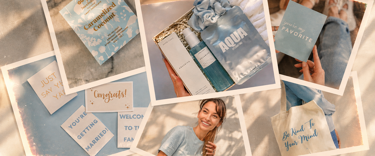 A collage of lifestyle photos showing a coordinated wedding stationery and gift set. Visible items include light blue and white invitation cards, a matching gift bag labeled AODA, a tote bag, and a small blue satin bow, with a smiling woman holding one of the cards in one photo.